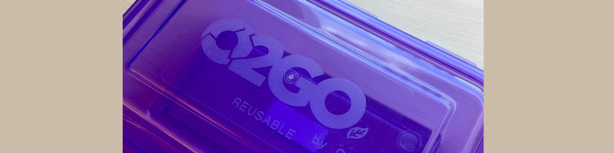 close-up photo of a purple OZZI reusable container