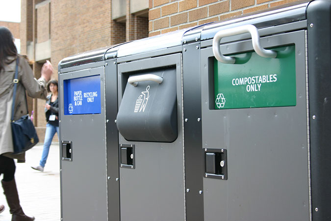 waste bins that say recycle garbage and compost only