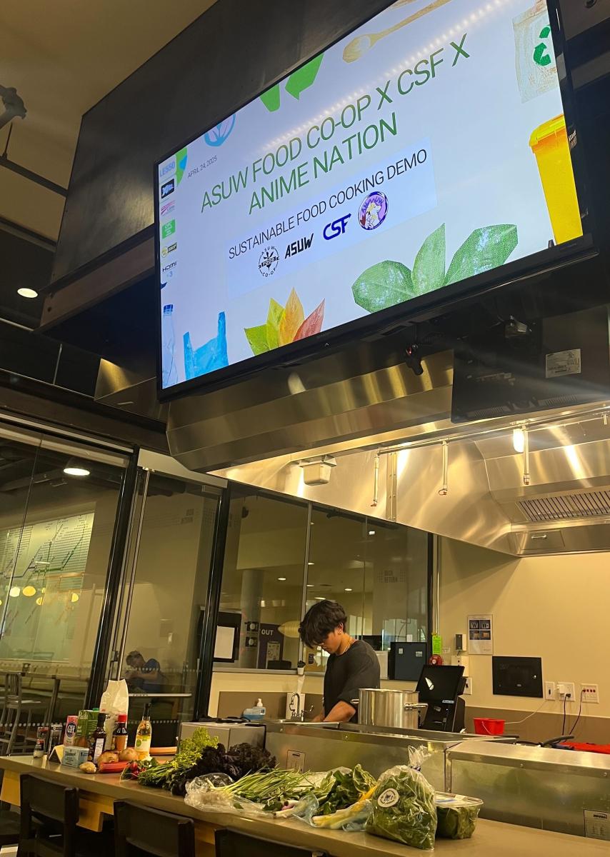 student preparing for cooking demo