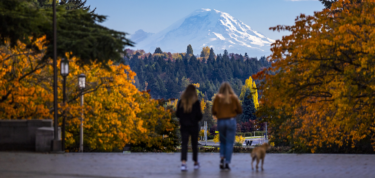 students on campus with Mt Rainier in background