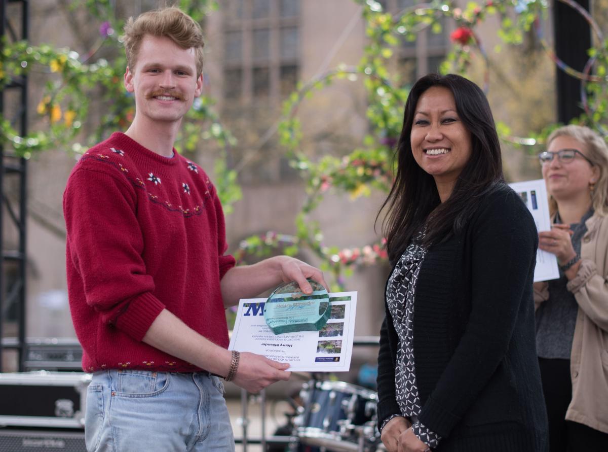 Husky Green Award winner accepting his award.