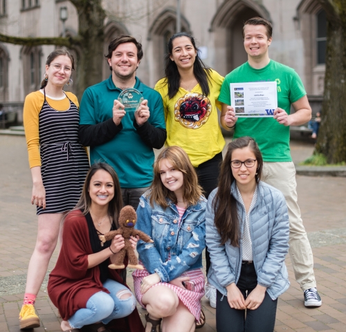 Husky Green Award winners from EcoReps accepting their awards.