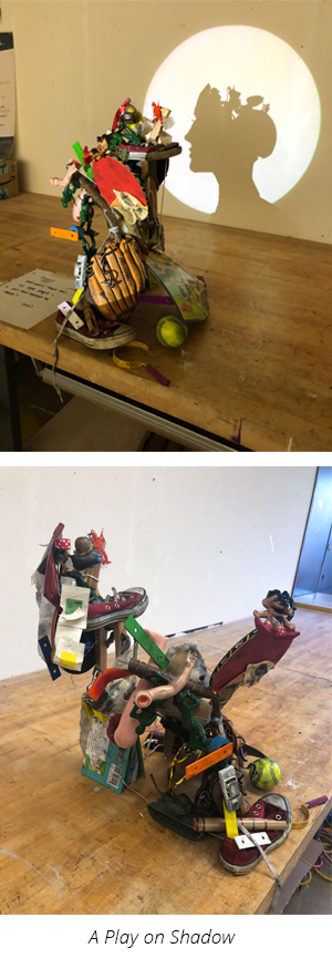 Art piece made from found objects, super glue and string