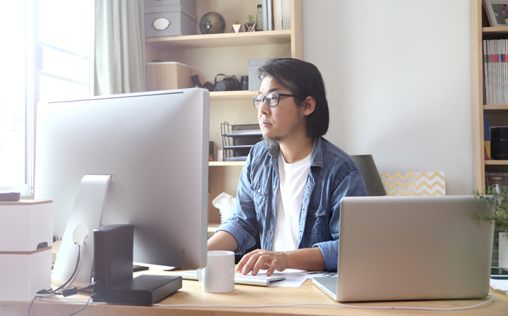 man working at computer