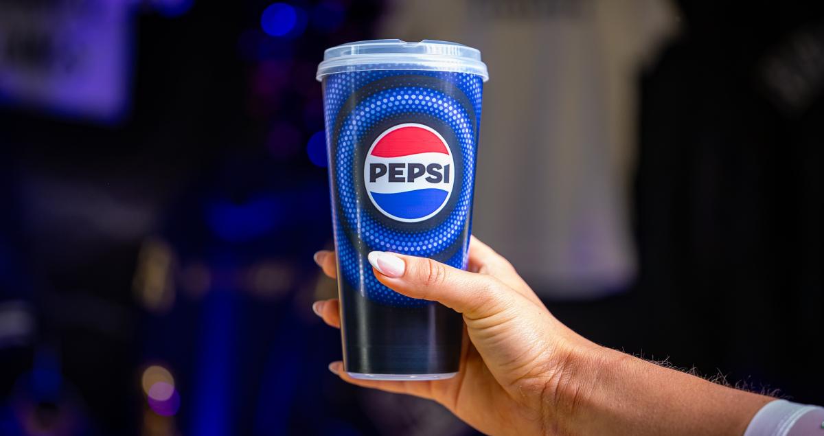 hand holding reusable cup