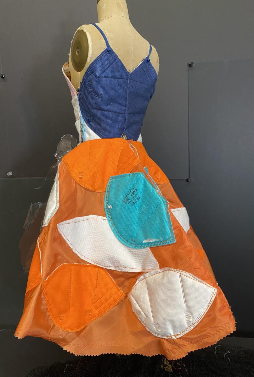 dress made from face masks, the plastic covering of single use masks and fabric from clothes that would have been thrown away