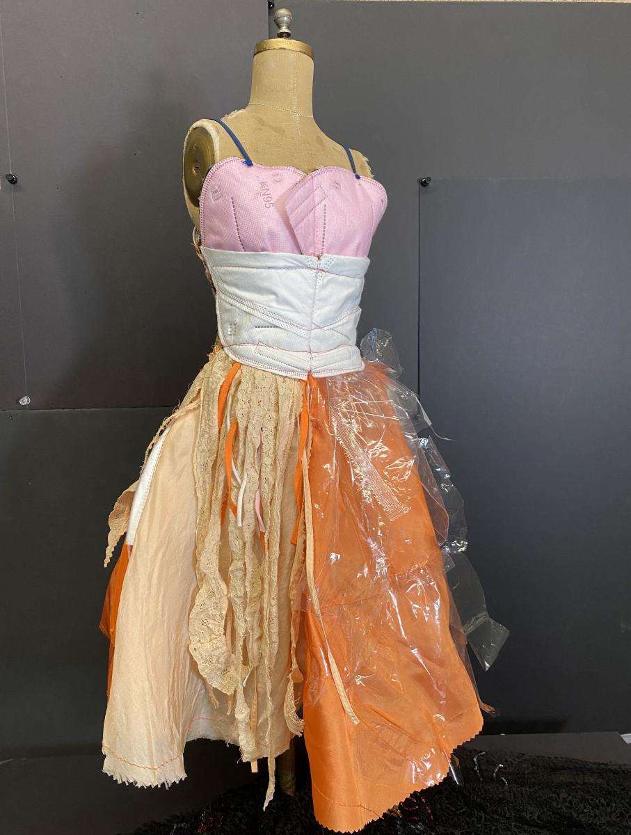 dress made from face masks, the plastic covering of single use masks and fabric from clothes that would have been thrown away