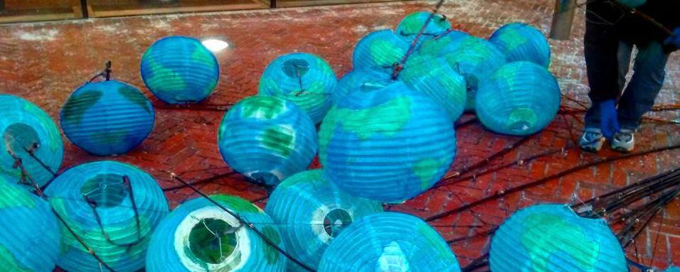 Paper lanterns painted as globes.