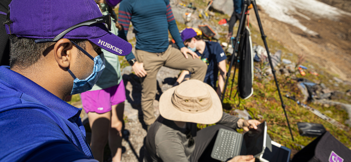 students and faculty do field research on mountain glaciers