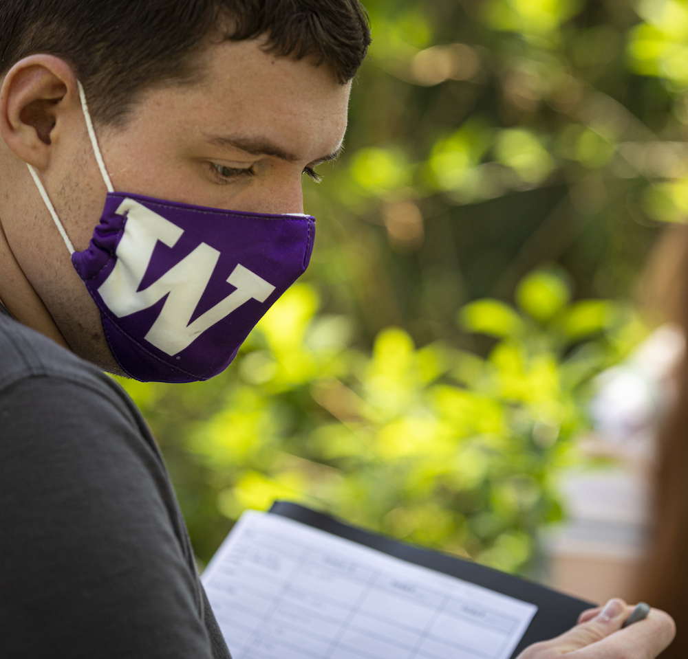 UW student with notebook