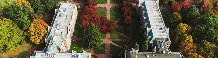 aerial view of the south end of the quad with buildings pathways trees and grass in view