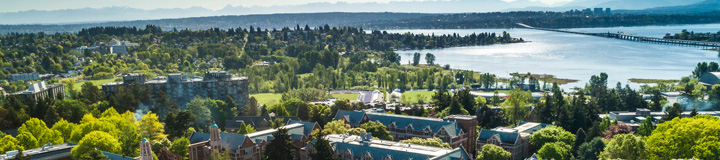 aerial view of seattle campus the 520 bridge and mountains
