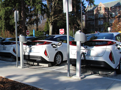 electric cars charging in a UW parking lot
