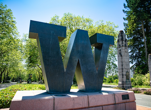 Large bronze W statue on campus.